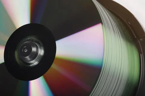 Stack Of DVDs Against A White Background In A Studio Environment Foto stock