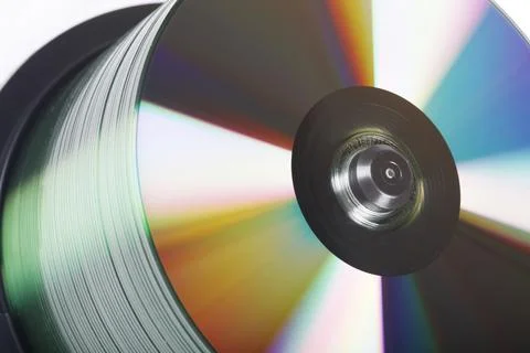 Stack Of DVDs Against A White Background In A Studio Environment Foto stock