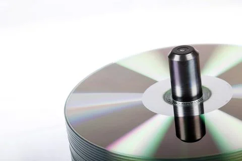Stack Of DVDs Against A White Background In A Studio Environment Foto stock