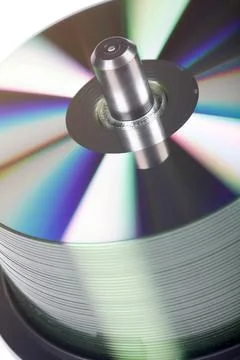 Stack Of DVDs Against A White Background In A Studio Environment Stock Photos