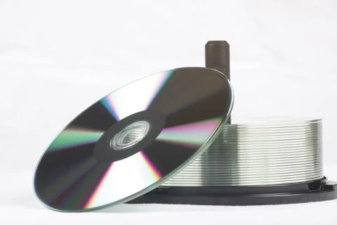 Stack Of DVDs Against A White Background In A Studio Environment Stock Photos