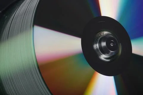 Stack Of DVDs Against A White Background In A Studio Environment Foto stock