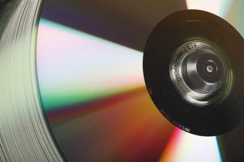 Stack Of DVDs Against A White Background In A Studio Environment Foto stock
