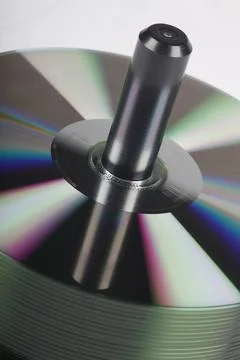 Stack Of DVDs Against A White Background In A Studio Environment Foto stock