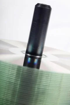 Stack Of DVDs Against A White Background In A Studio Environment 写真素材