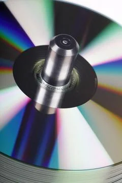 Stack Of DVDs Against A White Background In A Studio Environment Foto stock