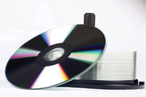 Stack Of DVDs Against A White Background In A Studio Environment Stock Photos