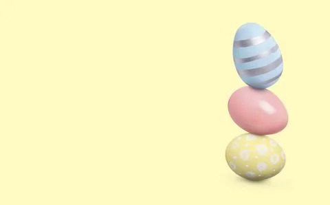 Stack of Easter eggs on beige background, space for text Stock Photos