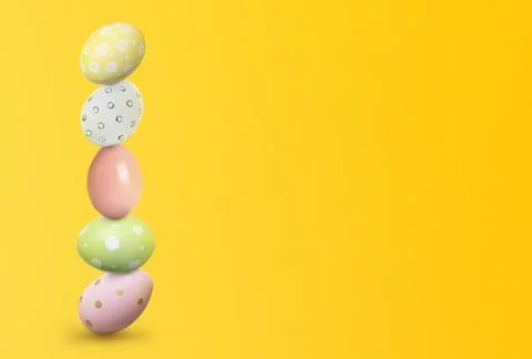 Stack of Easter eggs on yellow background, space for text Stock Photos