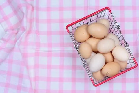 Stack of eggs in a shopping cart Stock Photos