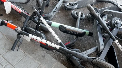 Stack of electric scooters Stock Footage 115511123