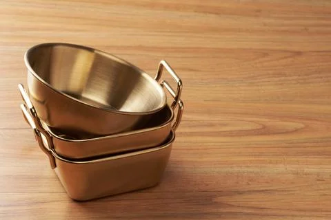 A stack of empty aluminium containers Foto stock