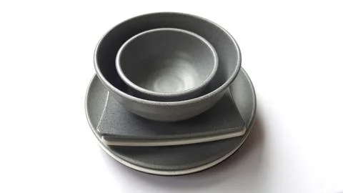 Stack of empty circle grey bowls with ceramic melamin Stock Photos