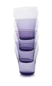 Stack of empty colorful glasses on white background Stockfoto's