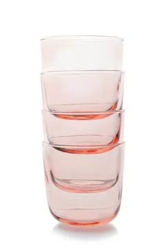 Stack of empty colorful whiskey glasses on white background 스톡 사진