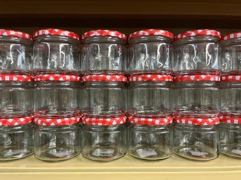Stack of Empty Mason Jars for Sale at Store Stock Photos