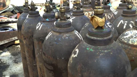 Stack of empty oxygen tank Video stock 164700593