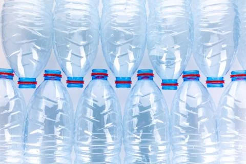 Stack of empty plastic water bottles Stock Photos