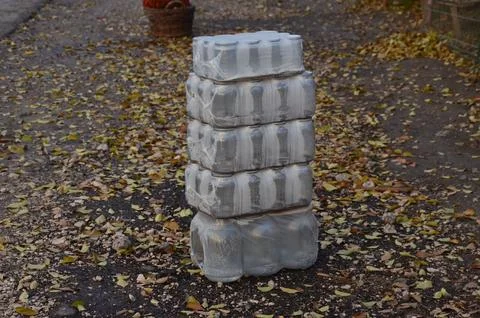 A stack of empty soda cans are piled on top of each other. Stock Photos