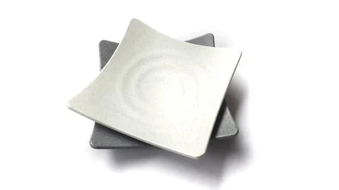 Stack of empty square white and grey plates with ceramic melamin material Stock Photos