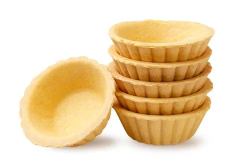 Stack of empty tartlets close-up on a white background. Isolated 스톡 사진