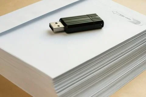 Stack envelopes and flash drive Foto stock