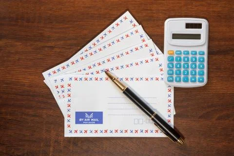 Stack of envelopes and pen Foto stock