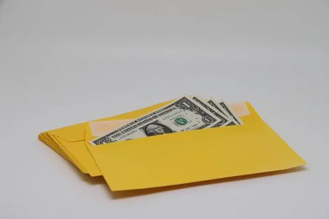 A stack of envelopes. Close-up with an envelope full of euro banknotes on a l Stockfoto's