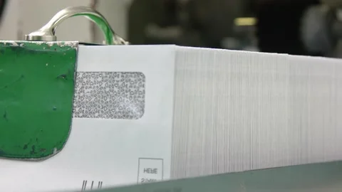 Stack of Envelopes grows larger as absentee ballots or taxes are sent via mail Video stock 136491499