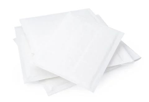 Stack of envelopes on white background Foto stock