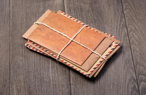 Stack of envelopes on wooden Foto stock