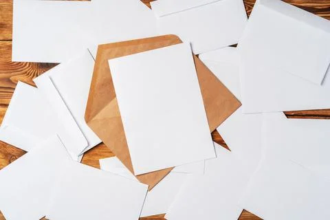 Stack of envelopes on working desk top view. Business mail Foto stock