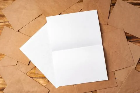 Stack of envelopes on working desk top view. Business mail Foto stock