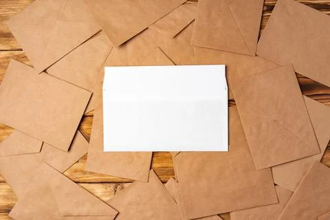 Stack of envelopes on working desk top view. Business mail Foto stock