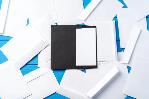 Stack of envelopes on working desk top view. Business mail Foto stock