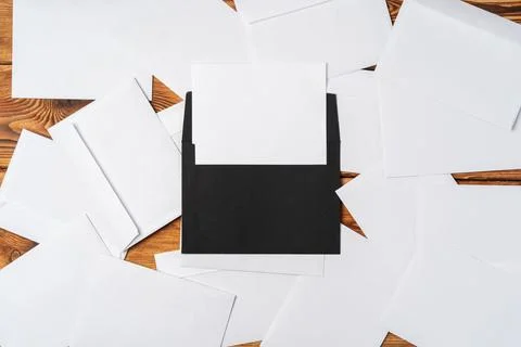 Stack of envelopes on working desk top view. Business mail Foto stock