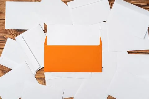 Stack of envelopes on working desk top view. Business mail Foto stock