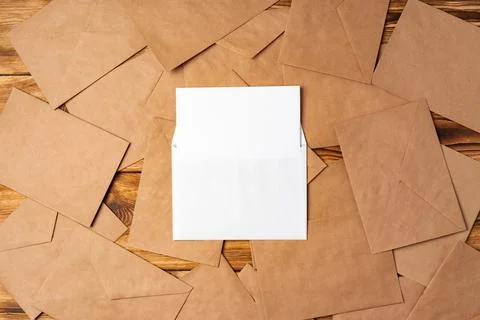 Stack of envelopes on working desk top view. Business mail Foto stock