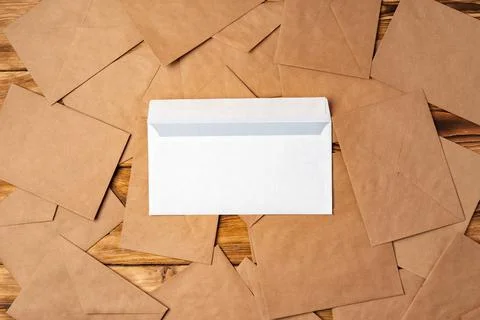 Stack of envelopes on working desk top view. Business mail Foto stock