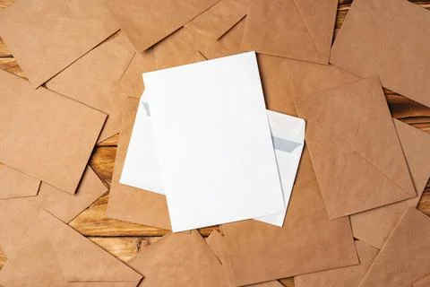 Stack of envelopes on working desk top view. Business mail Foto stock