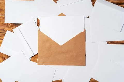Stack of envelopes on working desk top view. Business mail Foto stock