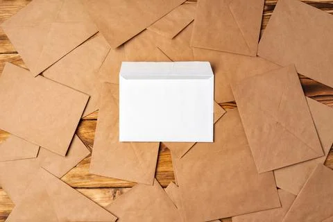 Stack of envelopes on working desk top view. Business mail Foto stock