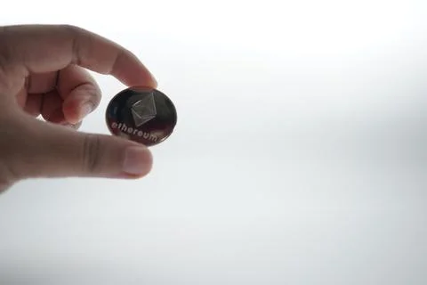 Stack of ether coins or ethereum on white background. Isolate white Foto stock