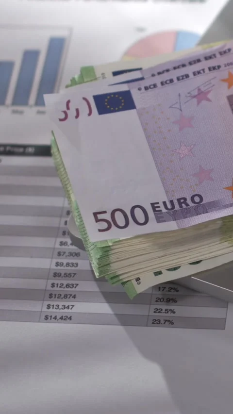 Stack of Euro Banknotes Falling onto Laptop in Slow Motion Stock Footage 338141869