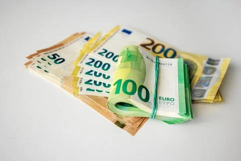 Stack of euro banknotes including 50, 100, and 200 denominations arranged o.. 스톡 사진