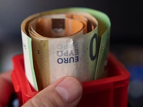 Stack of Euro Banknotes Inside a Red Cash Box Stock Photos