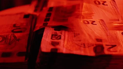 Stack of Euro Banknotes in Red Light - Economic Crisis and Finance Risks Stock Footage 304584812