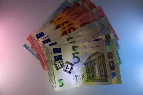 A stack of euro banknotes showing various denominations in a blurred backgrou Foto stock