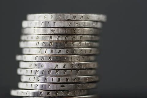 Stack of Euro coins on banknotes Stock Photos