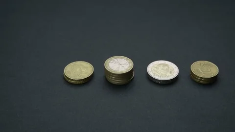 Stack of euro coins on black background with earning profit concept Stock Footage 197562650